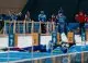 Maxim Macarov și Pavel Magazeev la startul probei de 20 km biatlon la Jocurile Olimpice de iarnă