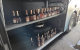 Zeci de sticle de alcool, descoperite de vameșii români ascunse într-un autocar care venea din Republica Moldova