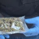 VIDEO // Grupare de traficanți de droguri, destructurată la Chișinău: LSD, ecstasy și hașiș, ridicate în urma perchezițiilor